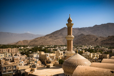 nizwa-mosque--nizwa--oman---february-28--2016-911295320-5b6a58cb46e0fb002c0c91eb.jpg